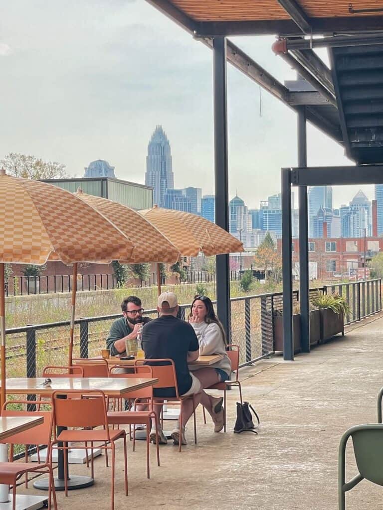 People eating outside at Camp North End Charlotte