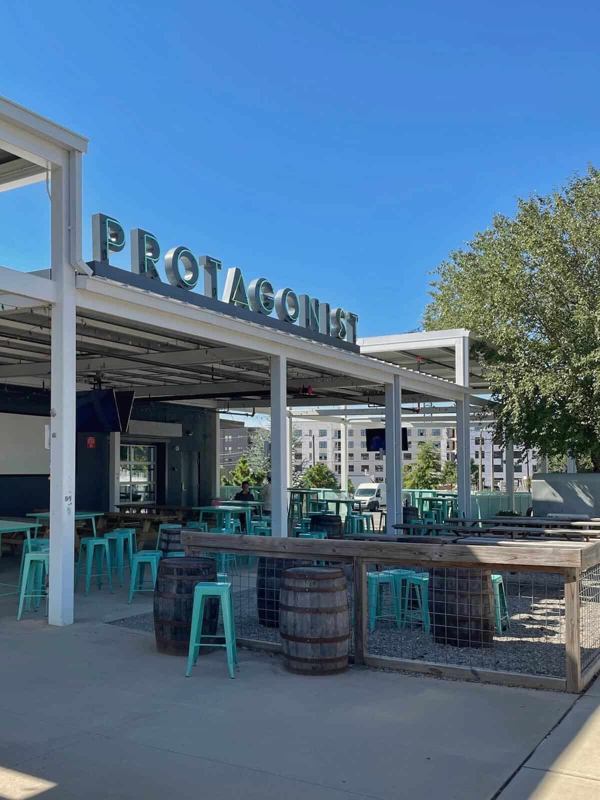 Protagonist Brewery in LoSo Charlotte front patio on a sunny day