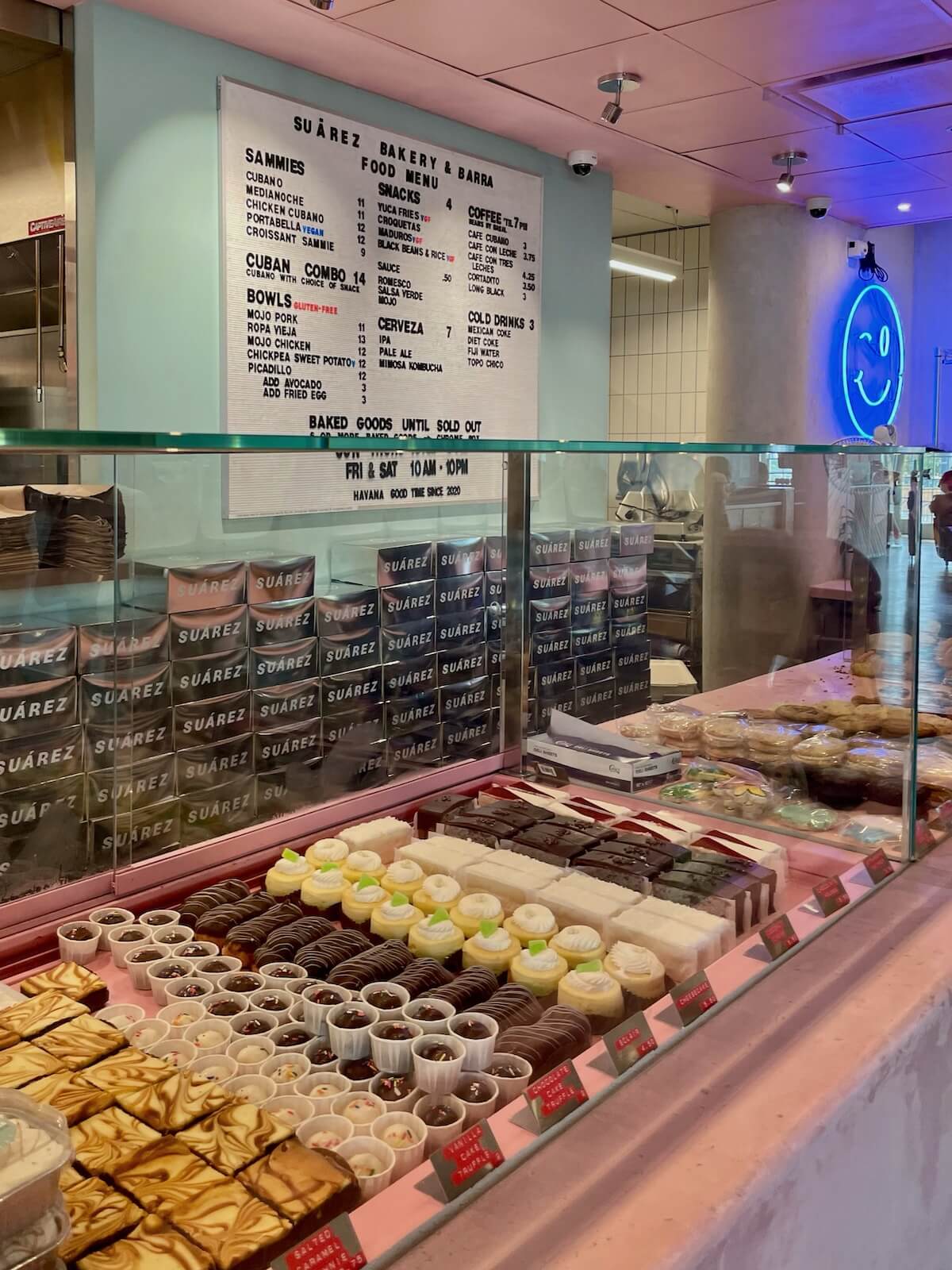 Bakery case with colorful pastries at Suarez Bakery at Optimist Hall in Charlotte
