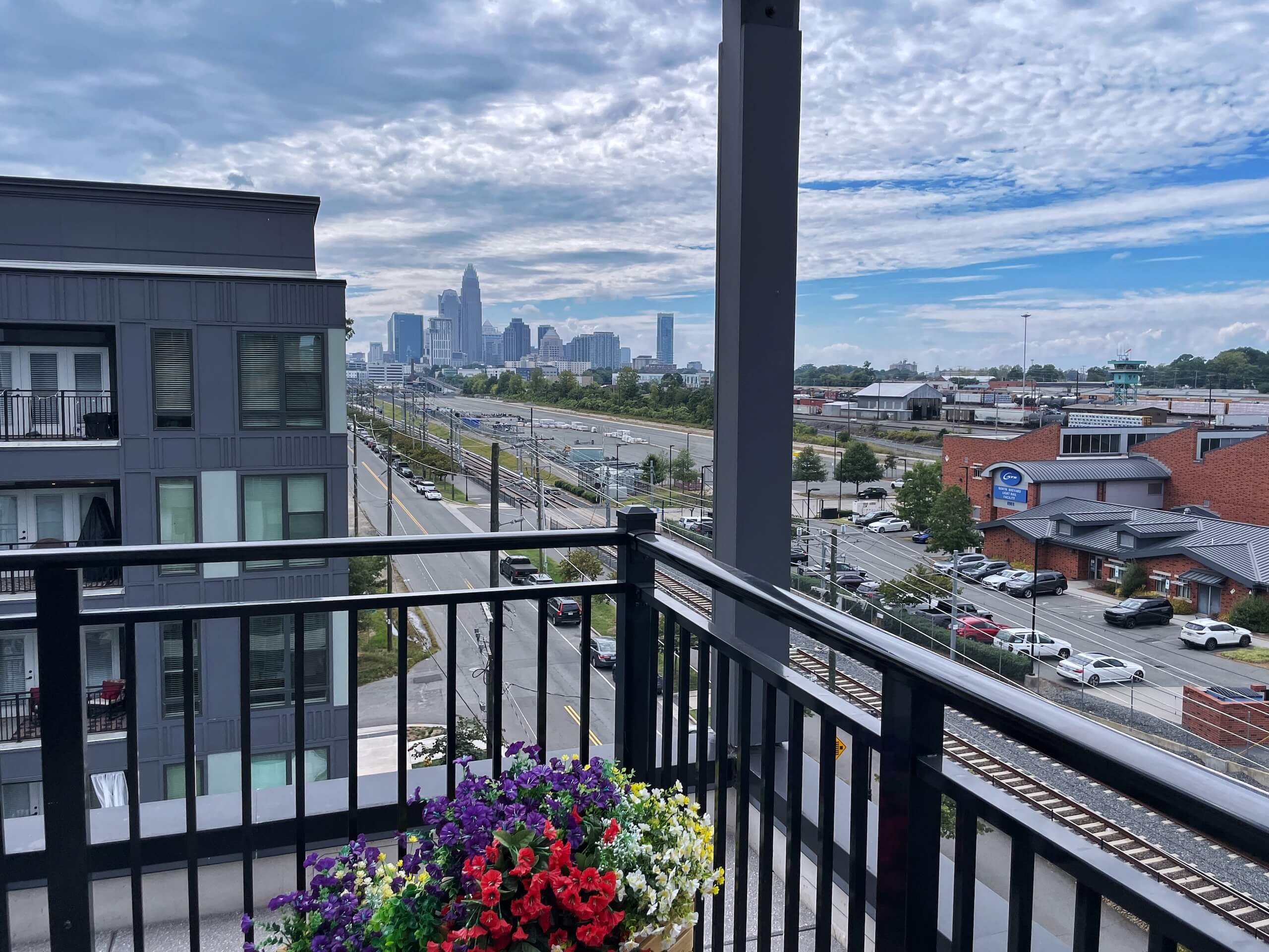 View of Uptown Charlotte taken from The Blake Optimist Park apartments rooftop terrace