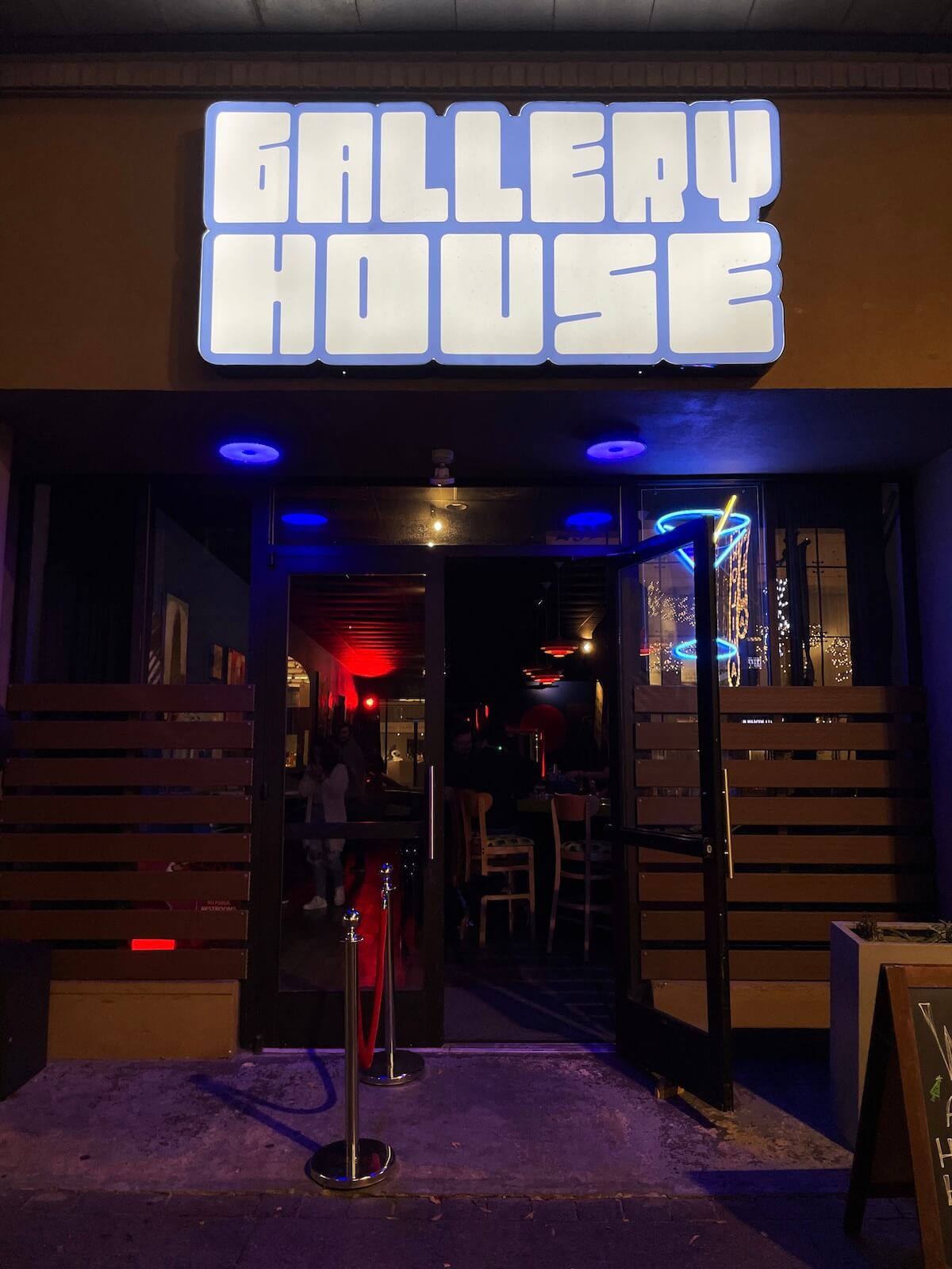 Gallery House in Uptown Charlotte at night
