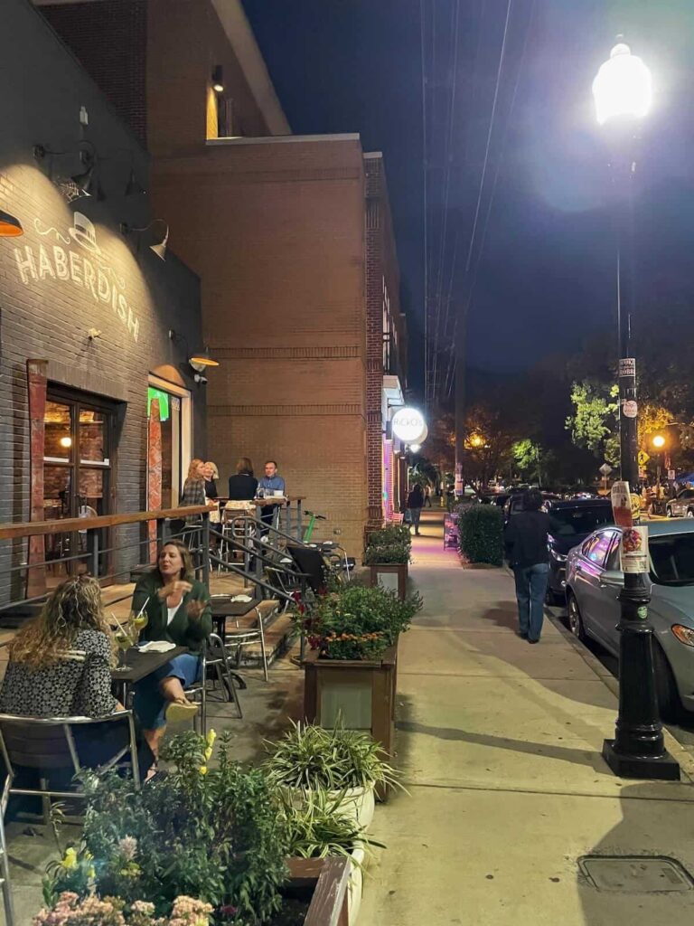 North Davidson Street at night in NoDa Charlotte, Haberdish patio