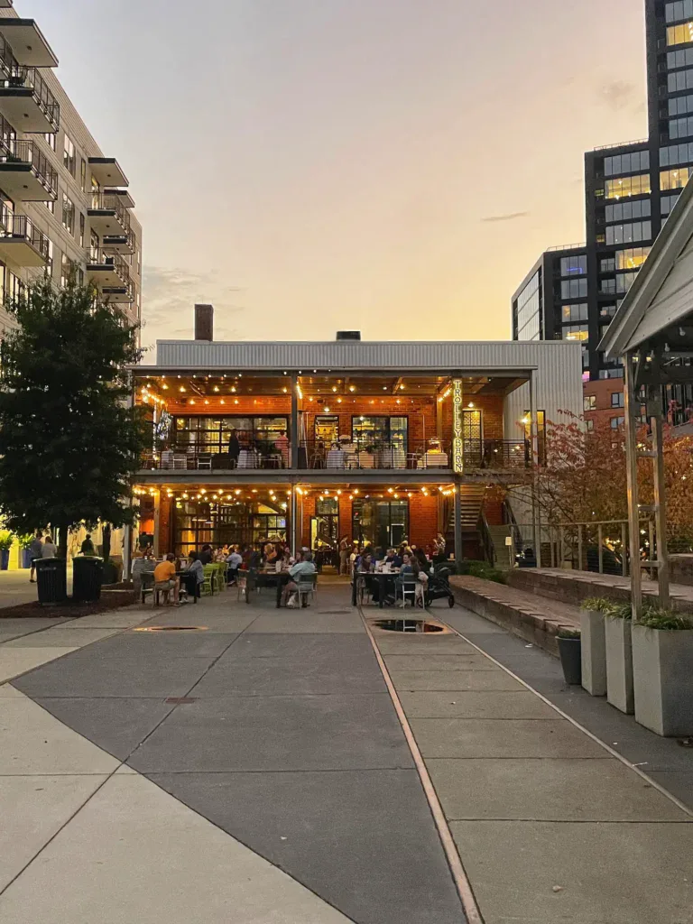 Restaurant patio at dusk in South End, a popular destination for people relocating to Charlotte.