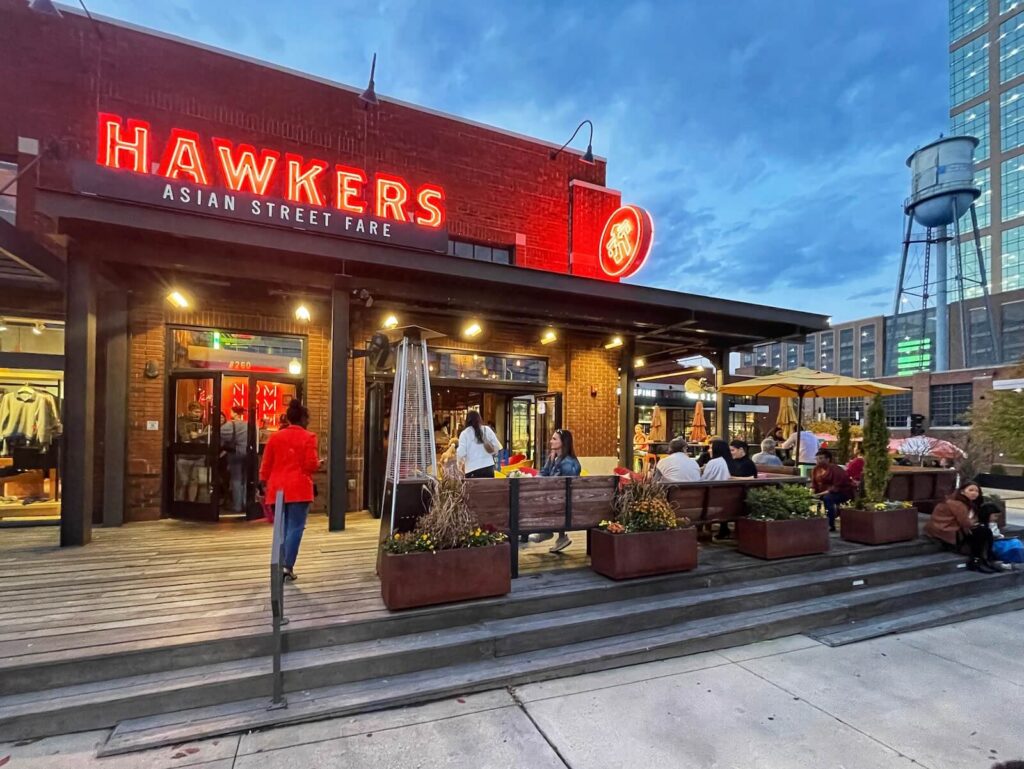 Hawkers Asian Street Fare patio at dusk in South End Charlotte